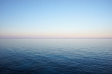 Seascape In Delicate Pastel Colors With The Horizon Of The Sea And Clear Sky Early In The Morning. Mediterranean Sea