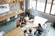 © Pixel-Shot - Young people having business meeting in modern office