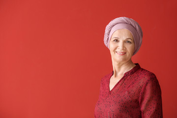 Sticker - Mature woman after chemotherapy on color background