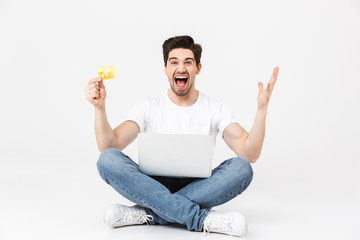 Poster - Full length portrait of a cheerful young man