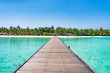Wooden pier at a tropical island luxury resort
