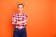 © deagreez - Portrait of attractive pretty youth magnificent feel satisfied ready work content glad dressed checked shirt plaid isolated orange background