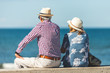 © Daniel Rodriguez - Loving the elderly couple sitting on the wall facing the beach, watching and taking pictures of the landscape on a romantic trip