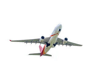 Wall Mural - Airplane takes off from international airport isolated on white background