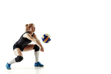 Young Female Volleyball Player Isolated On White Studio Background. Woman In Sport's Equipment And Shoes Or Sneakers Training And Practicing. Concept Of Sport, Healthy Lifestyle, Motion And Movement.