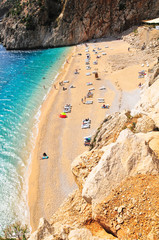 Wall Mural - Tourists sunbathing and swimming on the Kaputas Beach, Kas, Antalya Turkey 