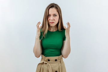 Wall Mural - Frustrated and stress emotion. Portrait of young woman against white background