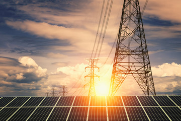 Wall Mural - solar panels with electricity pylon and sunset. clean power energy concept..