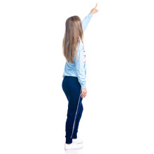 Woman In Blue Sweatpants Sport Style Casual Standing Looking Showing Pointing On White Background Isolation, Back View