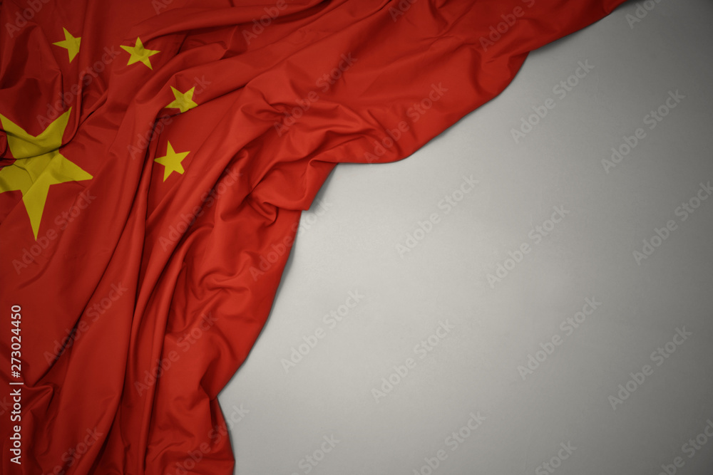waving national flag of china on a gray background. - obrazy, fototapety, plakaty 