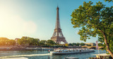 Fototapeta Paryż - The eifel tower in Paris from a tiny street