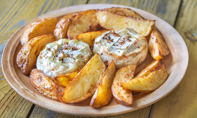 Canvas Print - Baked Camembert cheese with potato