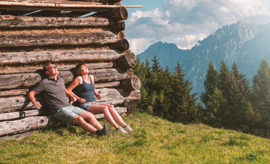 Young couple enjoying sun in the Austrian Alps