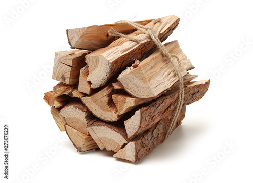 Cuadros en Lienzo Pile of firewood isolated on a white background