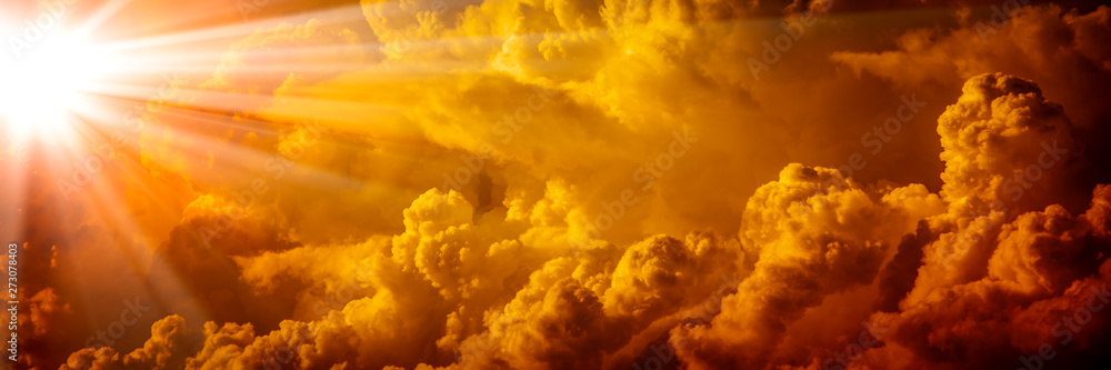 Bright Sunlight Shining Through Orange Clouds - obrazy, fototapety, plakaty 