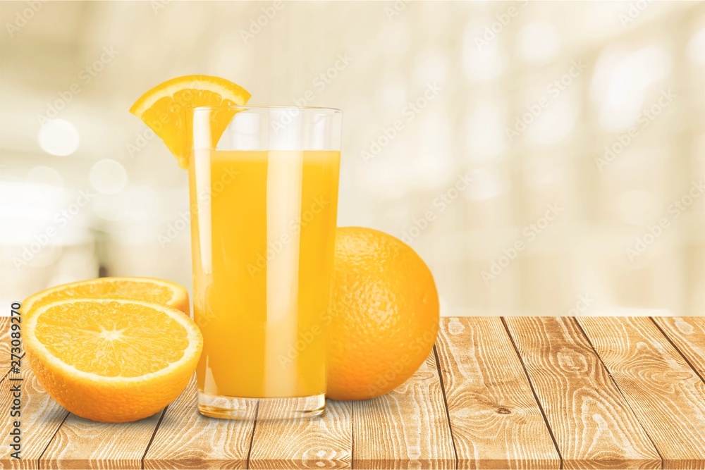 Orange juice and slices of orange on background - obrazy, fototapety, plakaty 