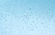 © Марина Красавина - wet glass during rain. blue wet background