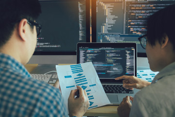 Wall Mural - developing programming and coding technologies working in a software engineers developing applicatio