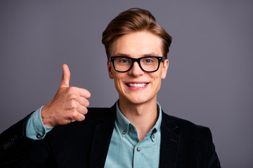 Wall Mural - Close up photo amazing him his guy macho specs perfect appearance hairstyle hand arm thumb finger raised up advising good quality service formal-wear shirt velvet jacket isolated grey background