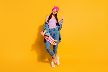 Sticker - Full length body size photo beautiful she her lady amazing nice look hand arm skate board dangerous sport v-sign symbol wear casual jeans denim jacket shoes pink hat isolated yellow vivid background