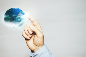 Poster - Touching planet with finger on a white background. Mixed media.