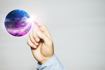 Poster - Touching planet with finger on a white background. Mixed media.