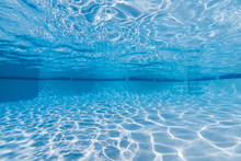 Underwater Sunlight Patterns In Empty Suburban Swimming Pool.  