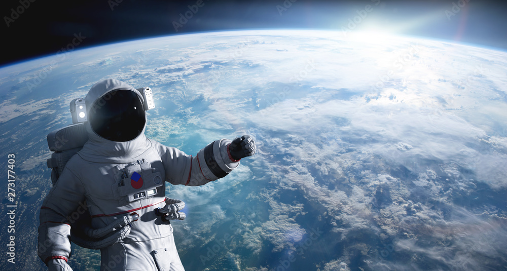 Astronaut conducting spacewalk on Earth orbit. - obrazy, fototapety, plakaty 