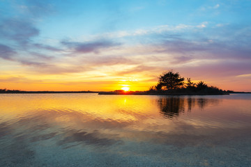 Wall Mural - Sinepuxent Bay sunset in Assateague Island, Maryland