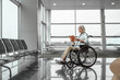 © Yakobchuk Olena - Mature lady on disabled carriage at waiting room