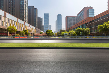 Wall Mural - Panoramic skyline and modern business office buildings with empty road,empty concrete square floor