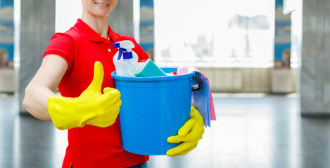 Wall Mural - The cleaning woman shows the quality work.