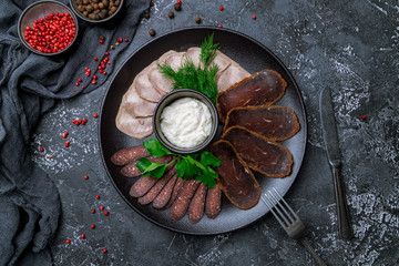 Sticker - slicing of different meat on black plate