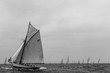Vintage yachts race in Barcelona. Old ships and boats in the sea. Black and white photos of nautical sports in the ocean. Regatta in mediterranean sea. Sails, mast, sheet, canvas in the sky. Holidays