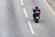 lone motorcycle on uk motorway in fast motion