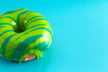 Green And Blue Striped Glazed Donut