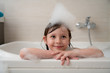 © .shock - little girl in bath playing with foam