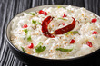Leinwandbild Motiv Thayir Saadam (Curd Rice) Recipe where  steamed rice and plain curd or with additional tempering of spices closeup in a plate. horizontal