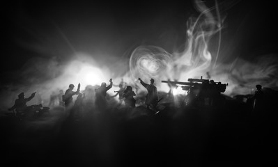 War Concept. Military silhouettes fighting scene on war fog sky background,