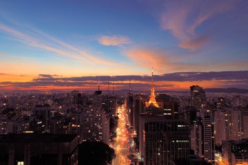 Aerial view of sunset in Sao Paulo city, Brazil. Great sunset scene. Fantastic landscape. Business city. Business travel. Business concept. Sunset collection. Colored sky. Dusk sky scenery. 