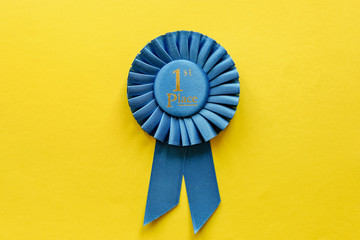 blue ribbon rosette for the first placed winner