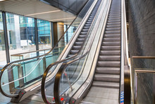 Escalators In An Train Station. Empty Escalator Stairs. Modern Escalator In Public Building, Shopping Mall, Department Store. Empty, No People