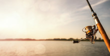Close Up Of A Fishing Rod During The Sunset With Copy Space