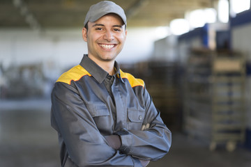 Wall Mural - Portrait of a smiling industrial worker