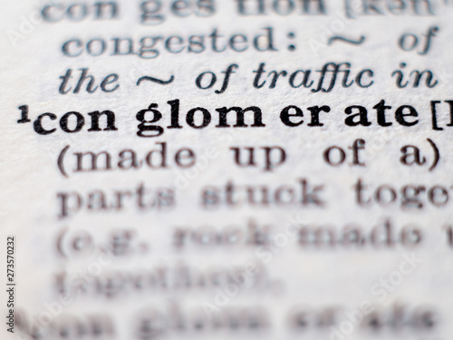 Fotografía Dictionary definition of word conglomerate. Selective focus.