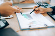 © I Believe I Can Fly - Business people analyzing investment graph meeting brainstorming and discussing plan in meeting room, investment concept
