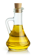 Delicious Olive Oil In A Glass Bottle, Isolated On White Background