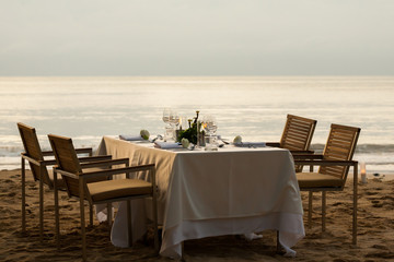 Wall Mural - dinner table on the beach at Thailand