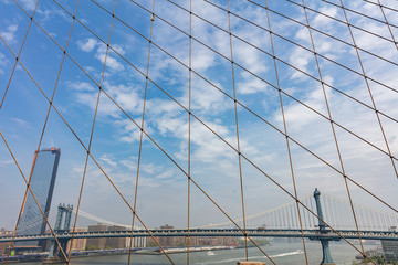 Fototapete - Manhattan Bridge over East river, New York city, view from Brooklyn bridge