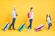 © Tom Wang - happy family with suitcase going on vacation